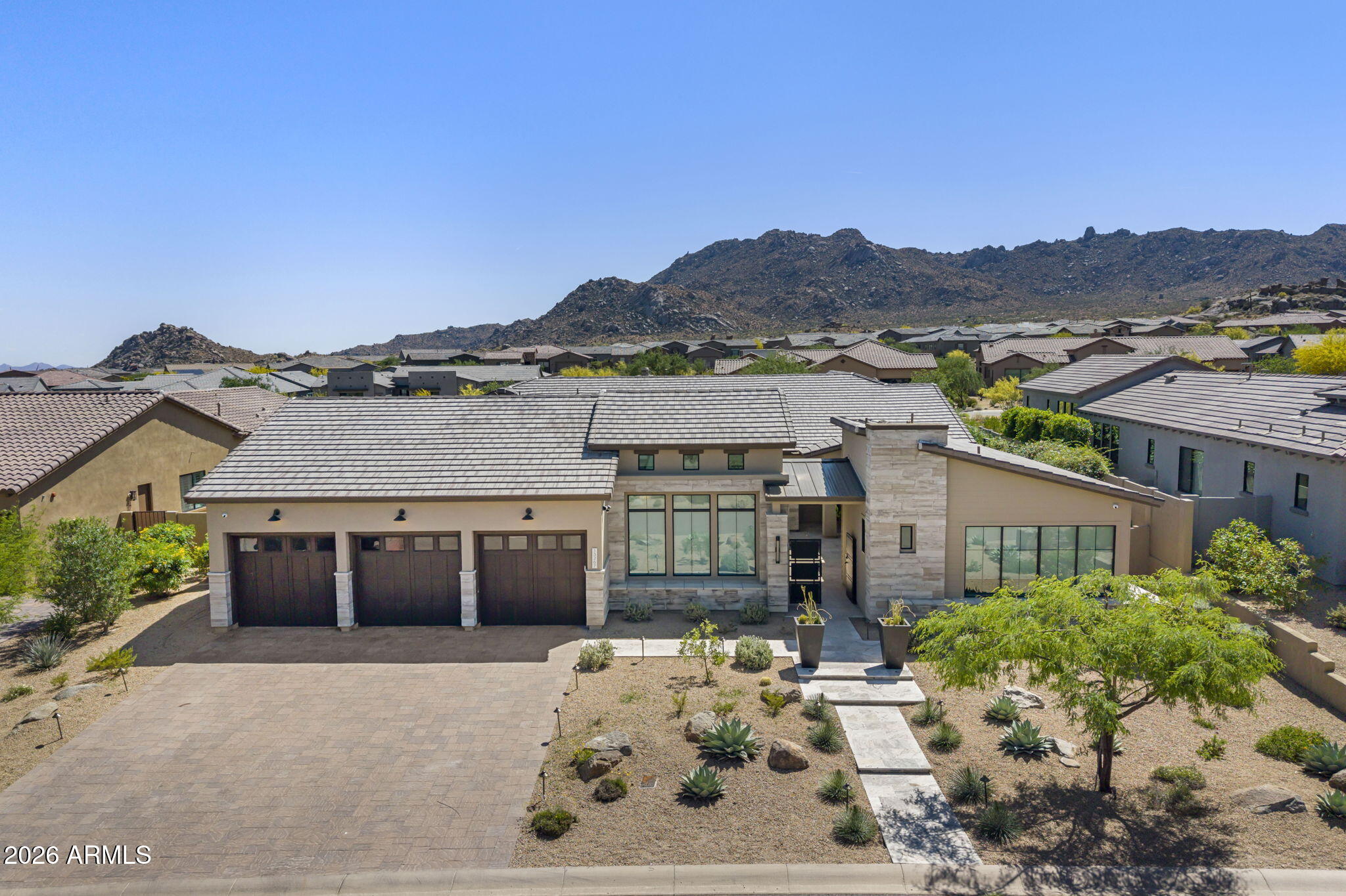 front view of a house with a yard