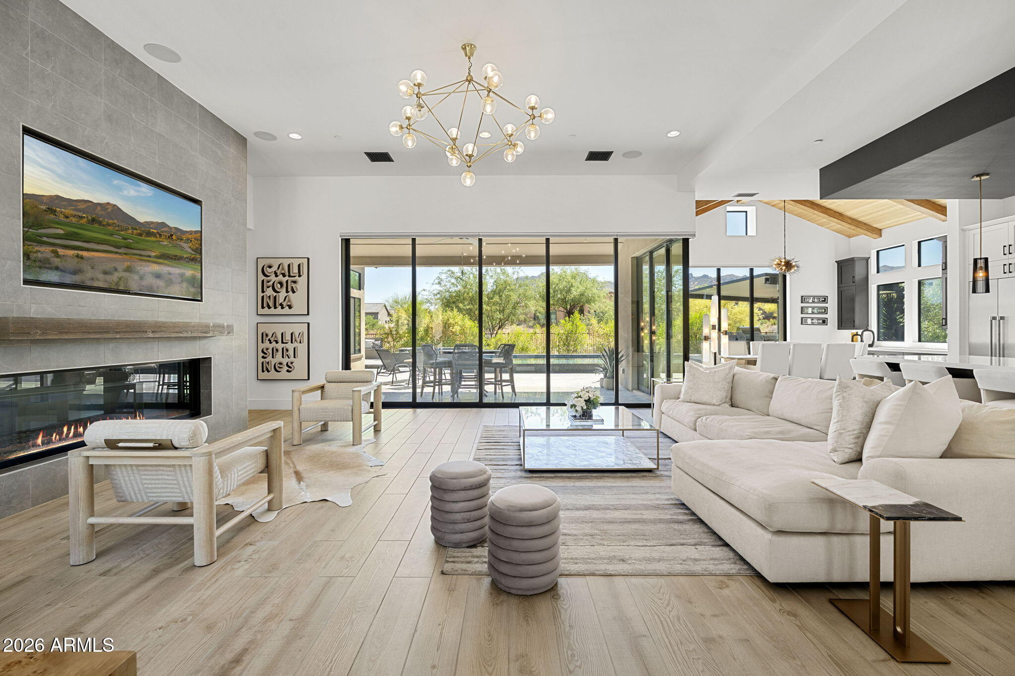 13267 East Ranch Gate Road Scottsdale, AZ 85255 - Photo 15 of 84 a living room with furniture and a fireplace