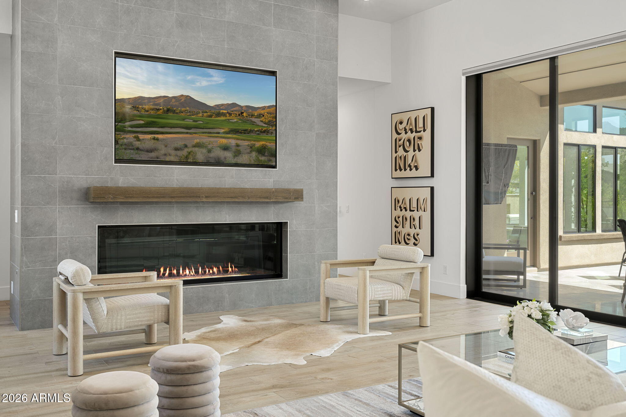 13267 East Ranch Gate Road Scottsdale, AZ 85255 - Photo 23 of 84 a living room with furniture and a fireplace