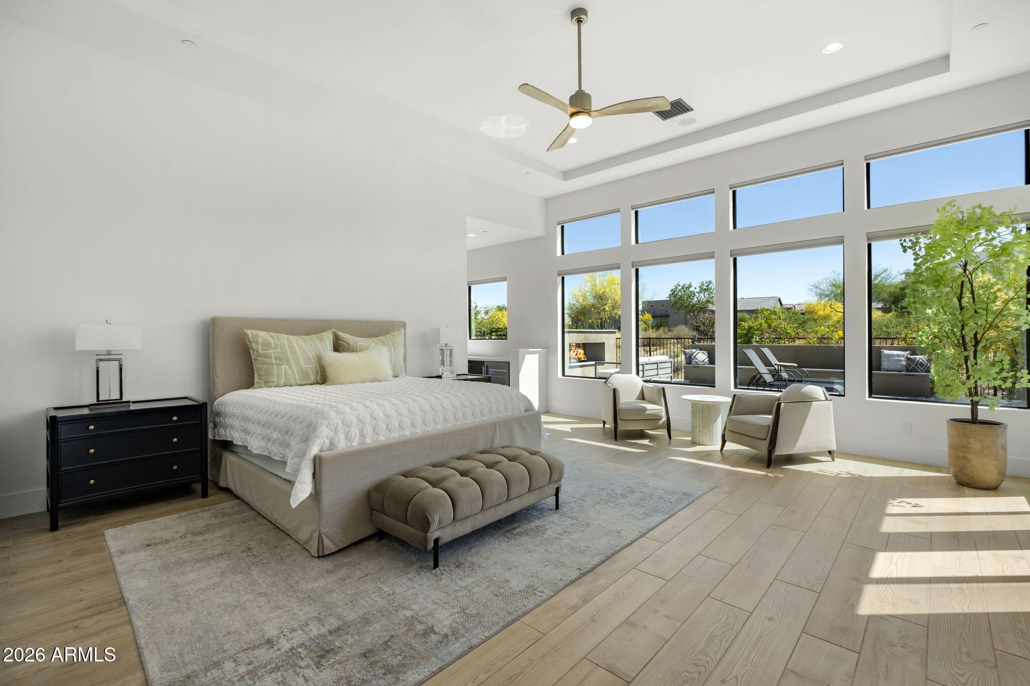13267 East Ranch Gate Road Scottsdale, AZ 85255 - Photo 35 of 84 a spacious bedroom with a bed and large glass window