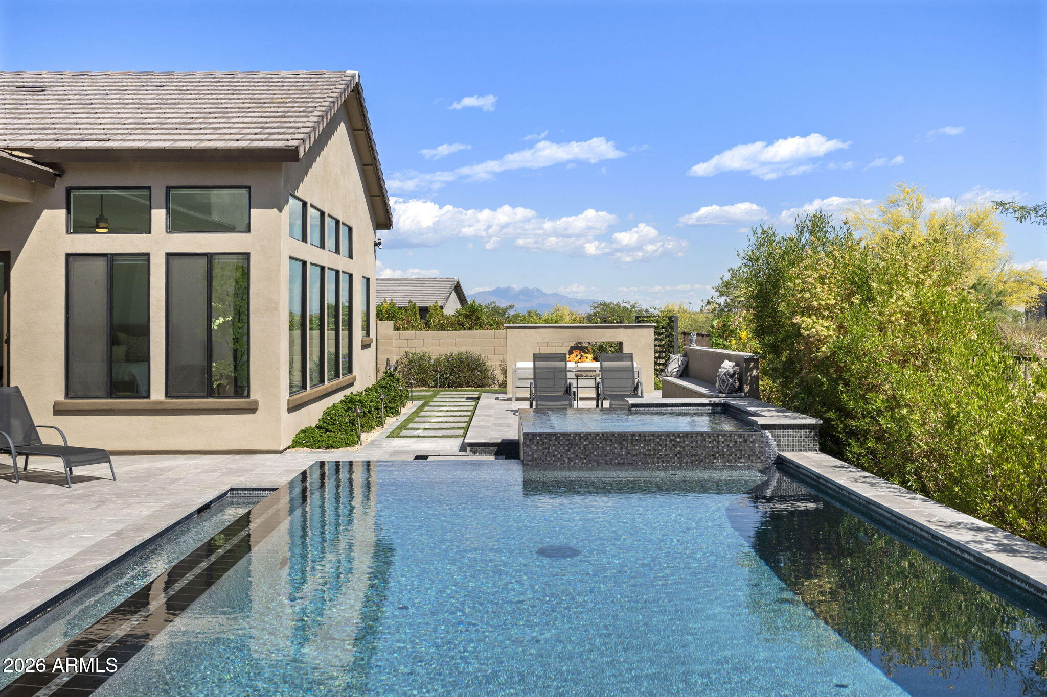 13267 East Ranch Gate Road Scottsdale, AZ 85255 - Photo 64 of 84 a view of a house with swimming pool and sitting area