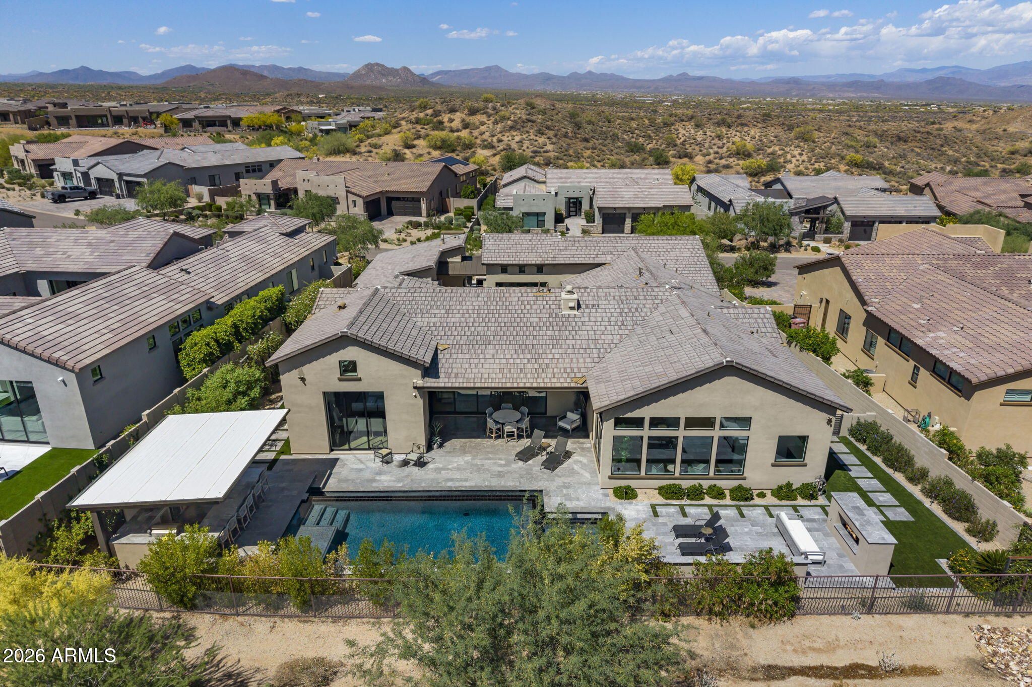 13267 East Ranch Gate Road Scottsdale, AZ 85255 - Photo 82 of 84 an aerial view of multiple houses with a lake