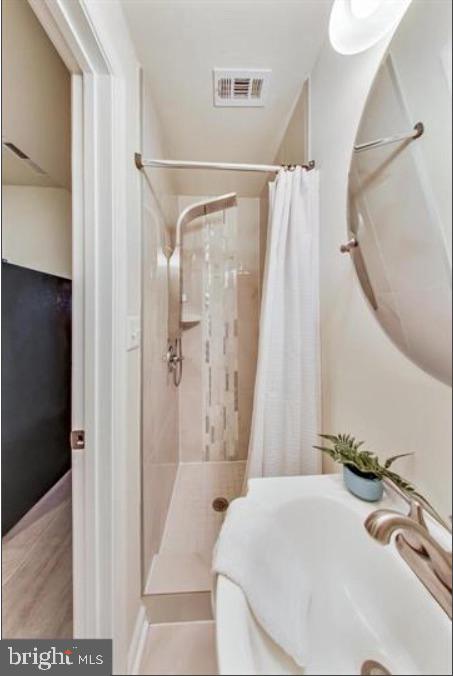 1720 H Street Northeast, Unit A Washington, DC 20002 - Photo 15 of 31 Modern bathroom with sleek design.