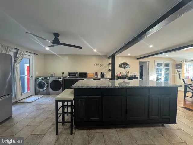 a view of entryway with a front door