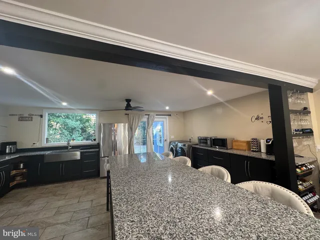 a view of a wooden deck with a bench