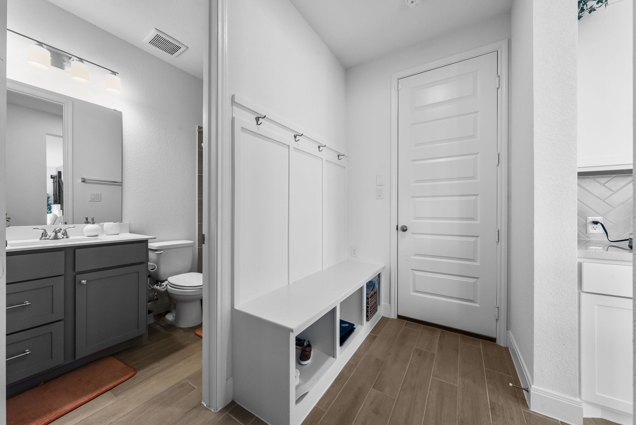 200 Marvins Bend Georgetown, TX 78626 - Photo 13 of 38 a bathroom with a double vanity sink a mirror and a shower