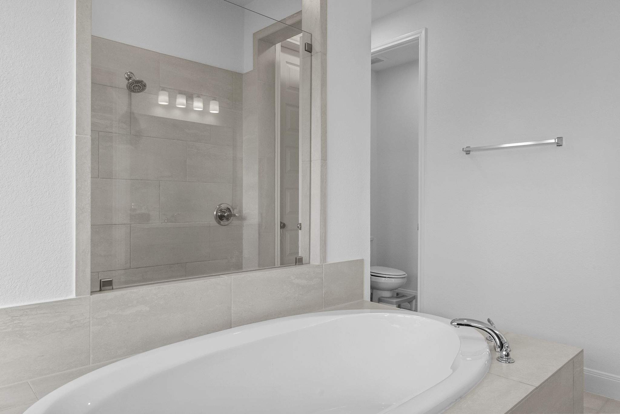 200 Marvins Bend Georgetown, TX 78626 - Photo 15 of 38 a bathroom with a bathtub and shower