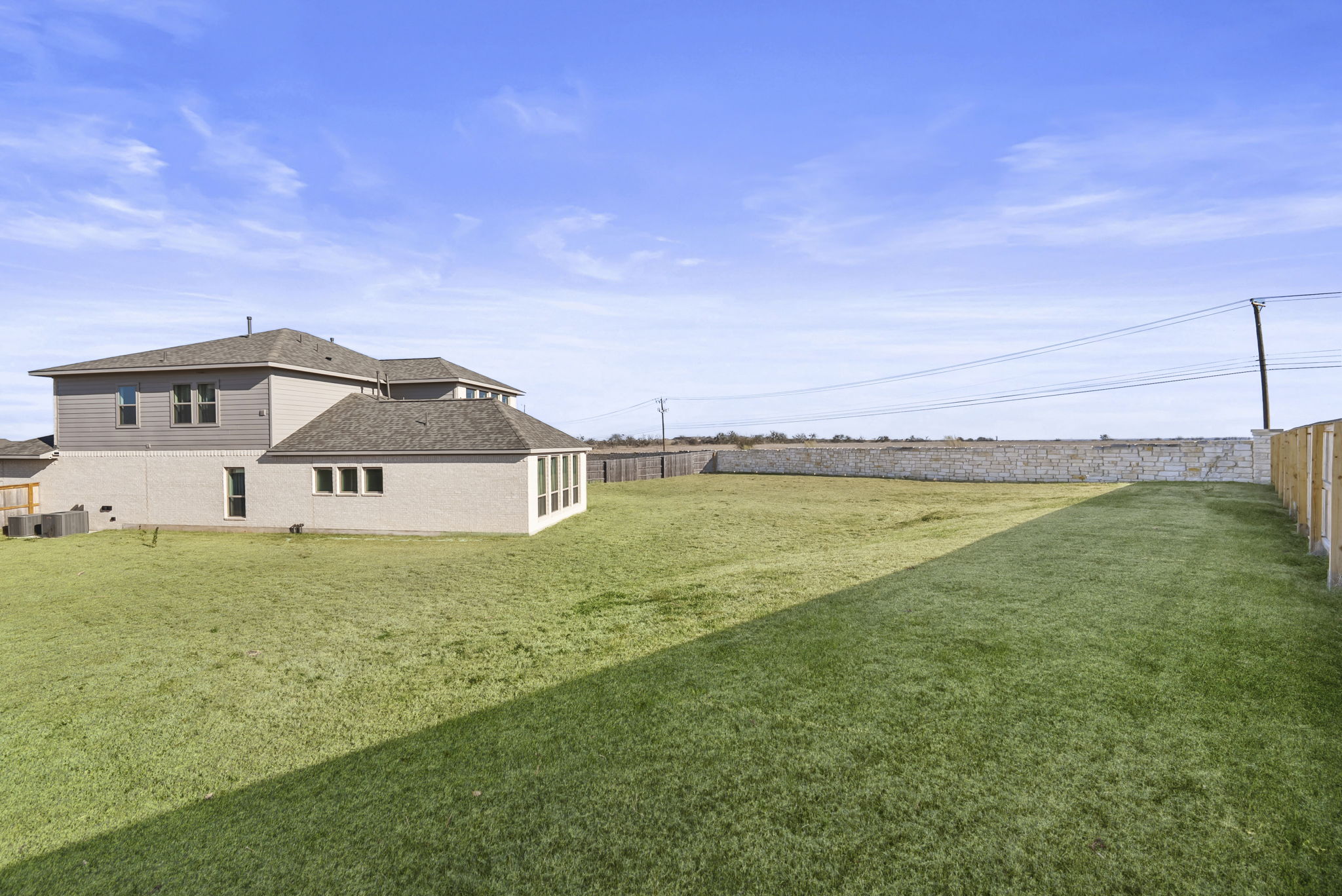 200 Marvins Bend Georgetown, TX 78626 - Photo 34 of 38 a view of a big house with a big yard and large trees