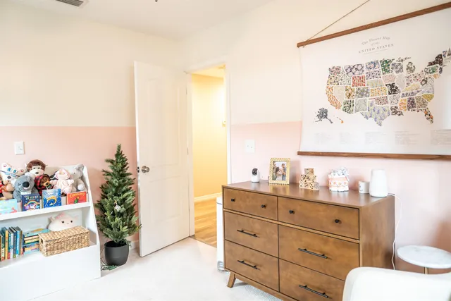 a view of kids room with baby toys