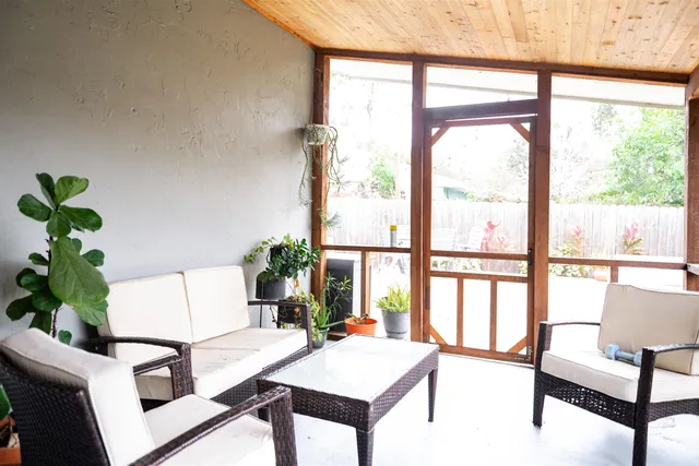 a view of a patio with swimming pool