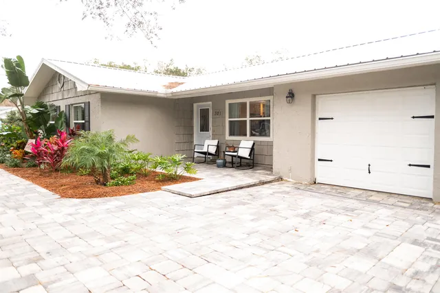 a view of a house with a patio