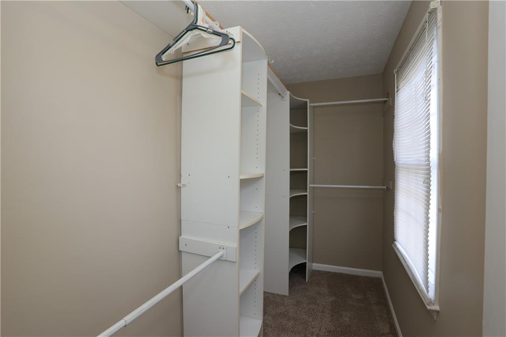 4981 Shallow Ridge Road Northeast Kennesaw, GA 30144 - Photo 24 of 36 a view of walk in closet with window