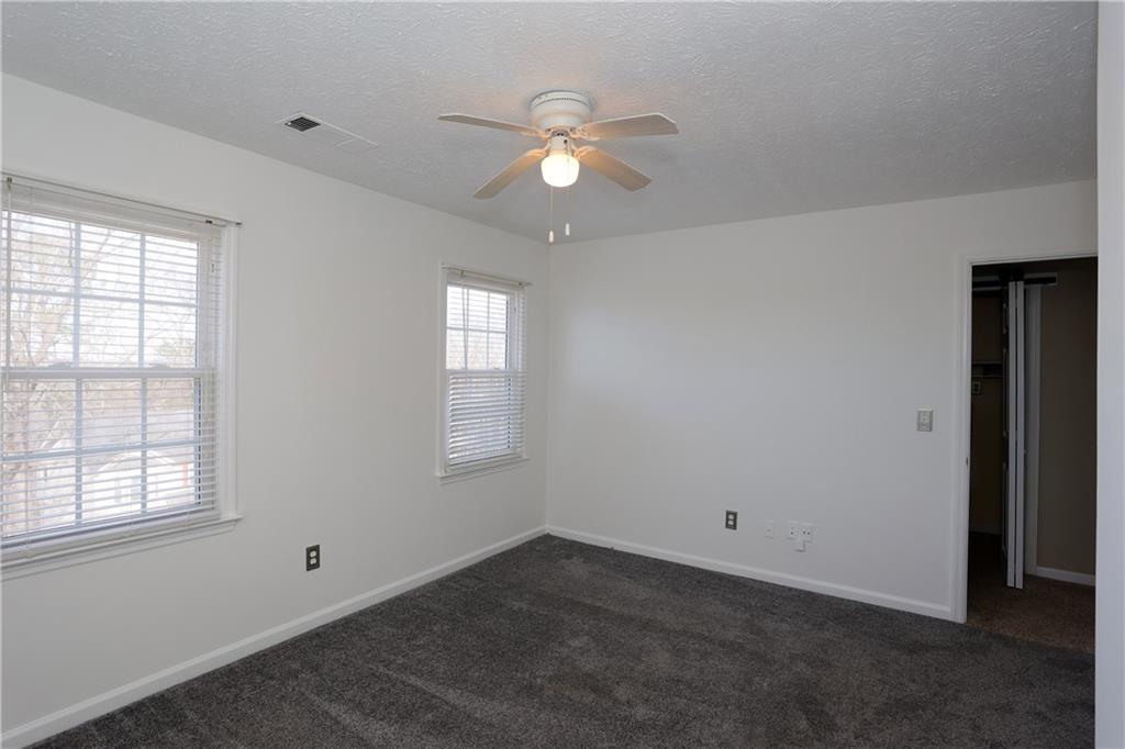 4981 Shallow Ridge Road Northeast Kennesaw, GA 30144 - Photo 33 of 36 a view of an empty room with a window