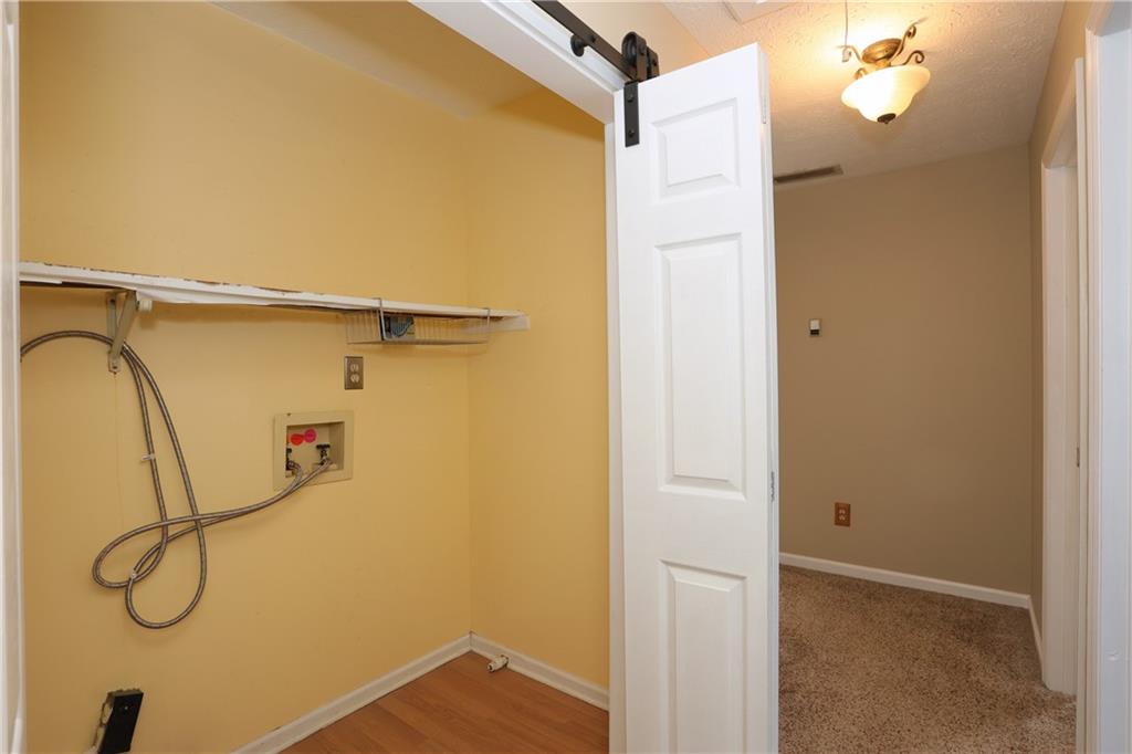 4981 Shallow Ridge Road Northeast Kennesaw, GA 30144 - Photo 34 of 36 a bathroom with a shower