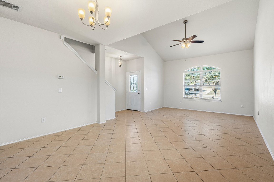 160 Albatross Cove Buda, TX 78610 - Photo 10 of 36 wooden floor in an empty room with a window
