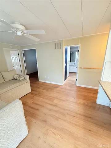 a kitchen with a stove and a refrigerator