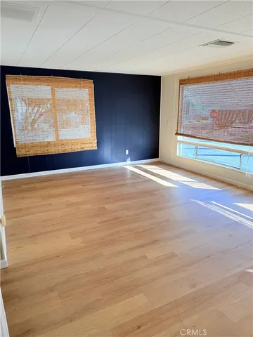 a view of a room with gym equipment and equipment