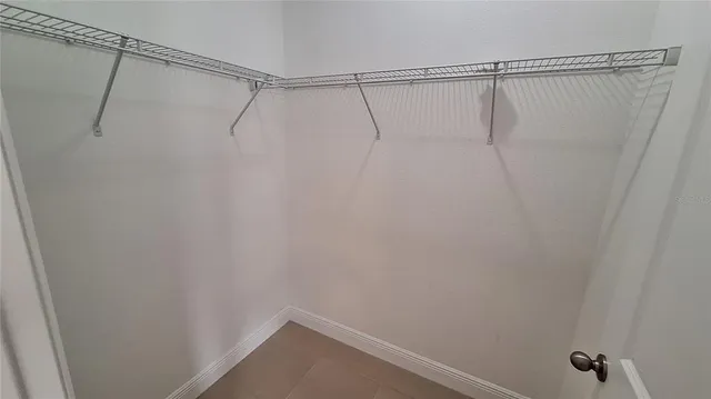 a view of a room with racks on the wall