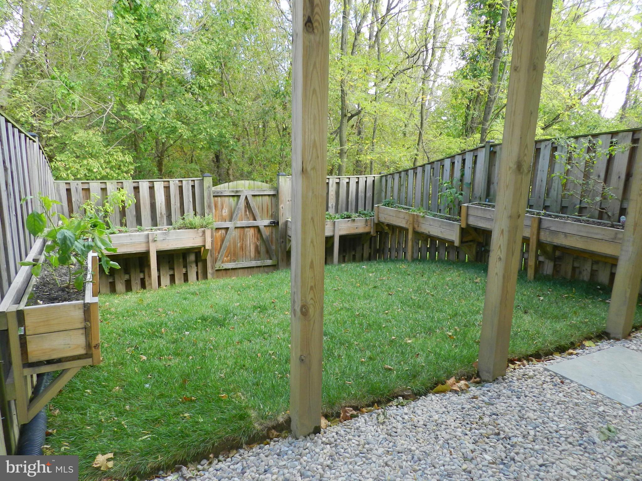 2185 Swains Lock Court Point of Rocks, MD 21777 - Photo 4 of 30 a view of a chair and table in backyard of the house