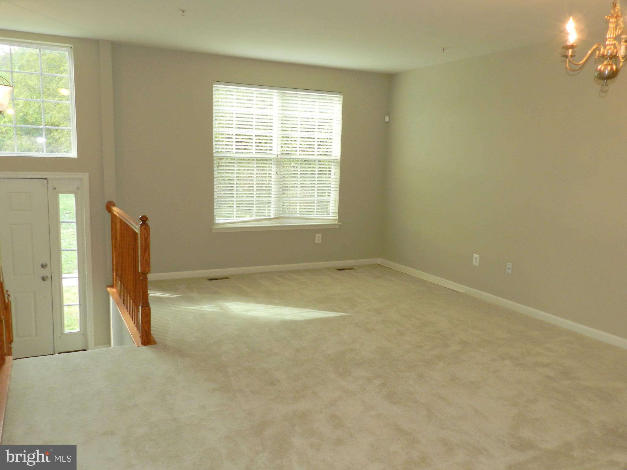 2185 Swains Lock Court Point of Rocks, MD 21777 - Photo 9 of 30 an empty room with a empty space and a window