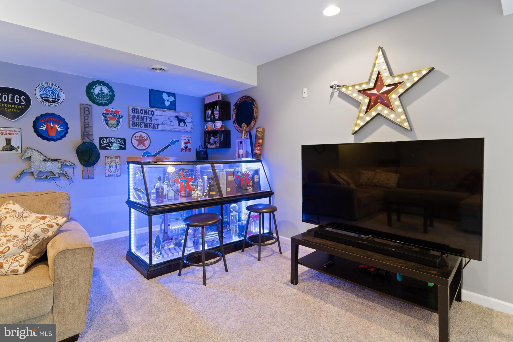 15 Warner Woods Road Elkton, MD 21921 - Photo 44 of 58 Large basement rec room w/ walkout & pellet stove