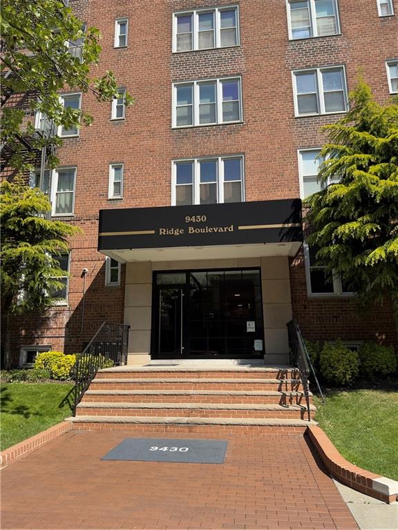 9430 Ridge Boulevard, Unit 1H Brooklyn, NY 11209 - Photo 1 of 7 a view of a building with a window and front door