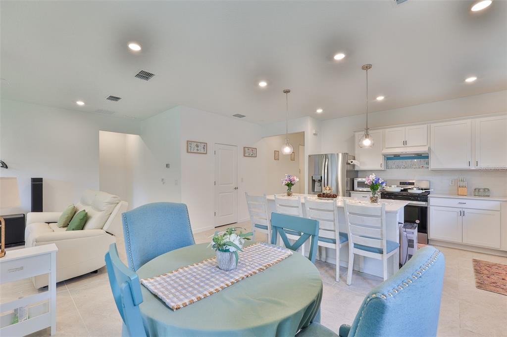 2948 Frst Mdw Avenue Valrico, FL 33594 - Photo 12 of 16 a living room with kitchen view and kitchen view