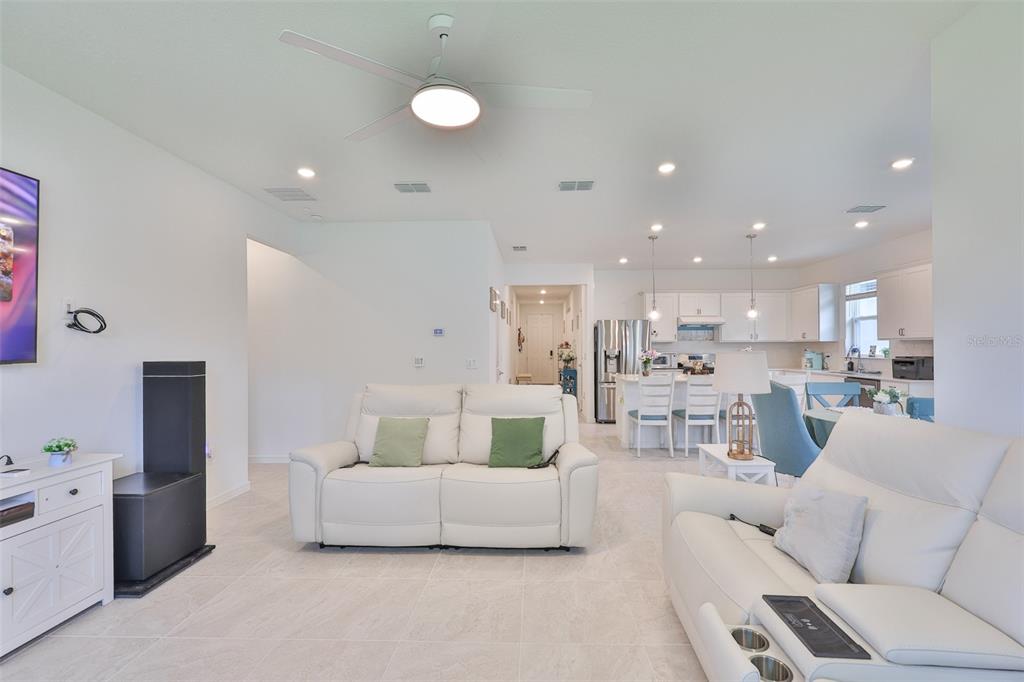 2948 Frst Mdw Avenue Valrico, FL 33594 - Photo 14 of 16 a living room with furniture and a view of kitchen