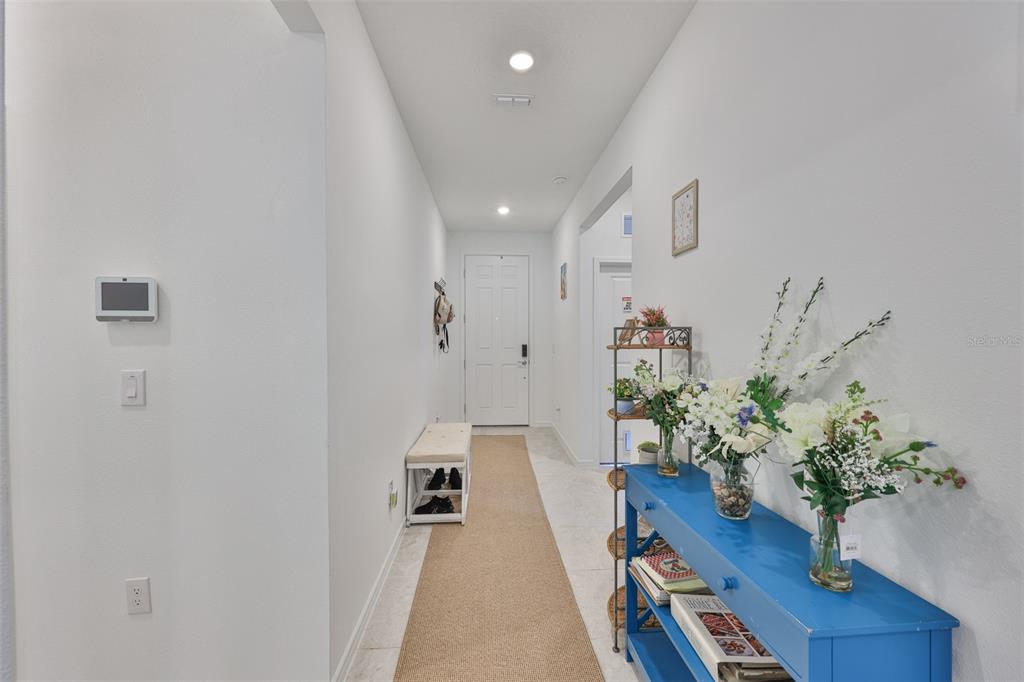 2948 Frst Mdw Avenue Valrico, FL 33594 - Photo 5 of 16 a living room with furniture and a potted plant