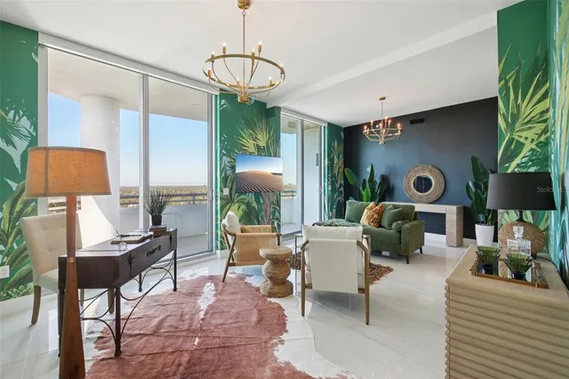 a kitchen with granite countertop kitchen island a counter space and stainless steel appliances