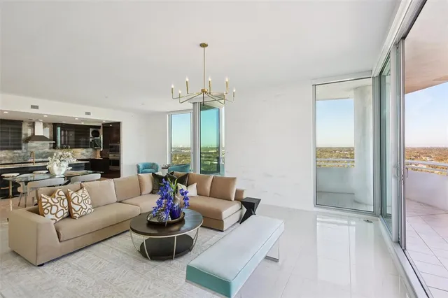 a bathroom with a granite countertop sink a mirror and shower