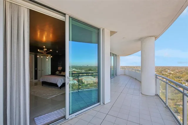 a bathroom with a sink mirror and toilet