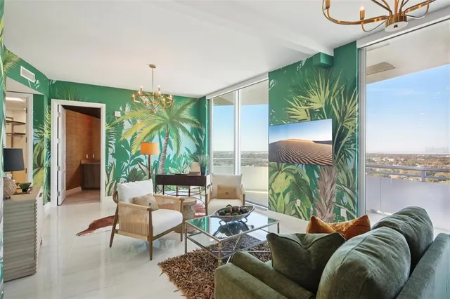 a view of a city with tall buildings in back of it