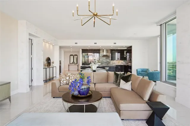 a bathroom with a double vanity sink mirror and bathtub