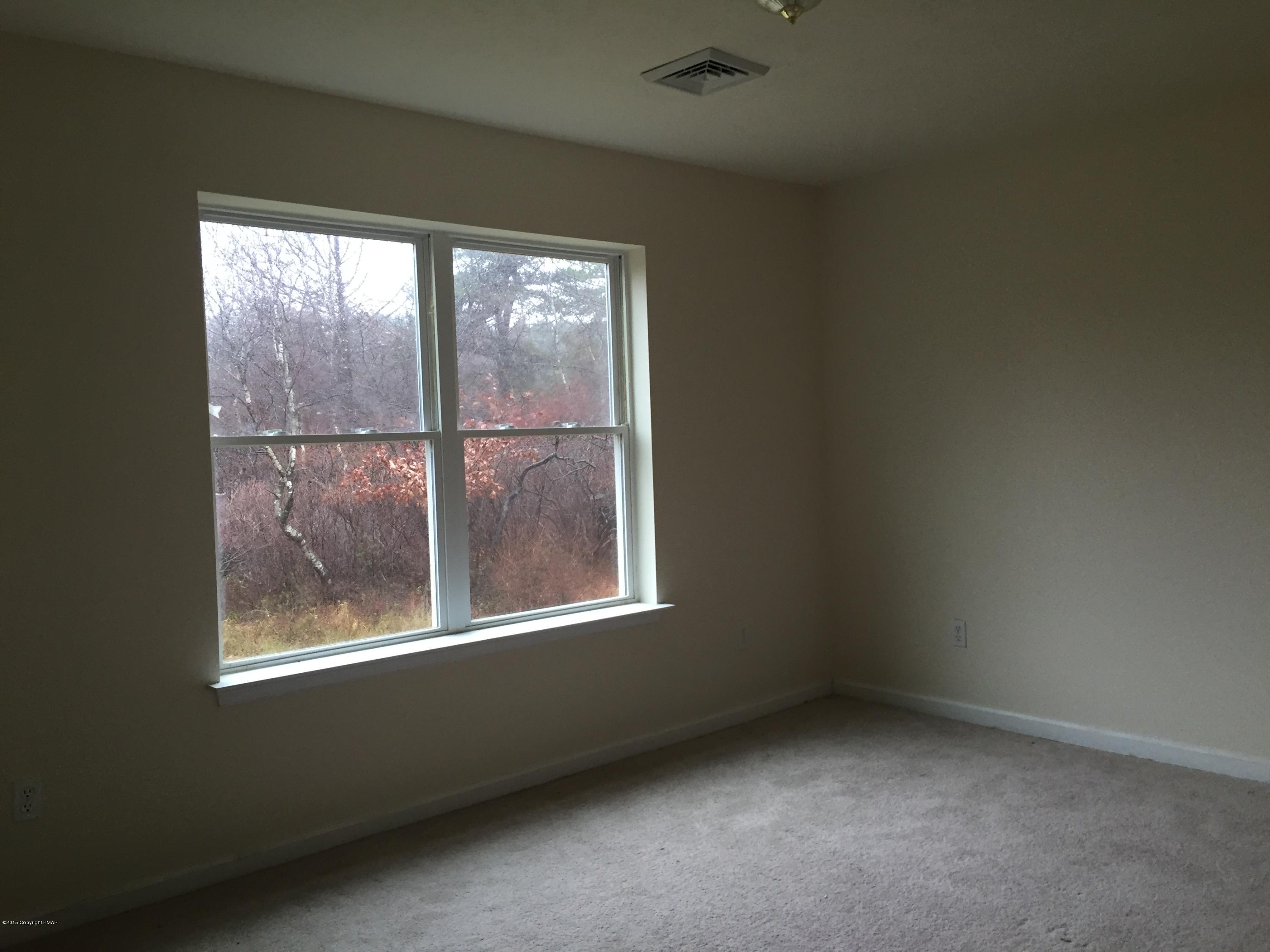 1653 Clover Road North Long Pond, PA 18334 - Photo 4 of 15 an empty room with a window