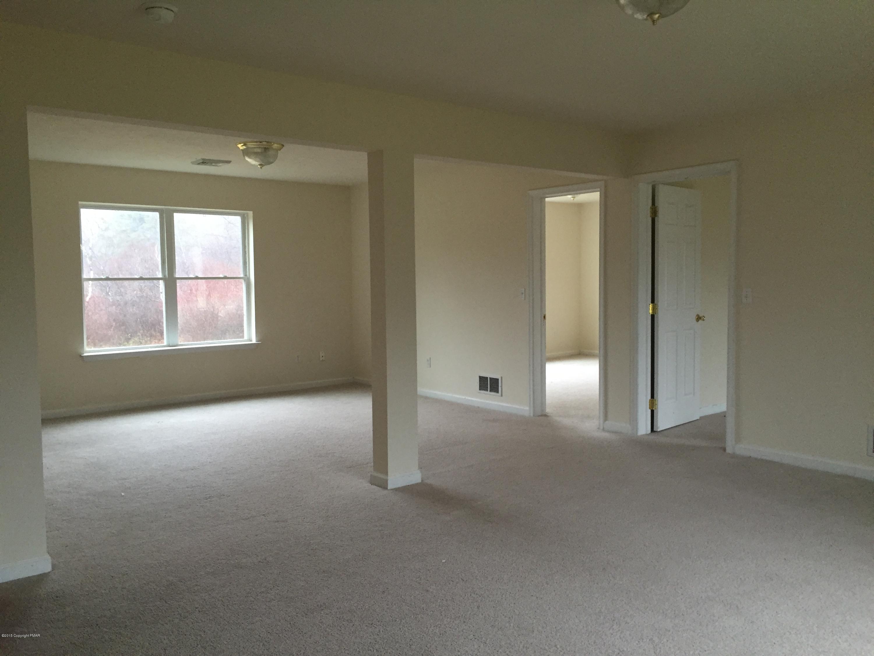 1653 Clover Road North Long Pond, PA 18334 - Photo 10 of 15 an empty room that has a window