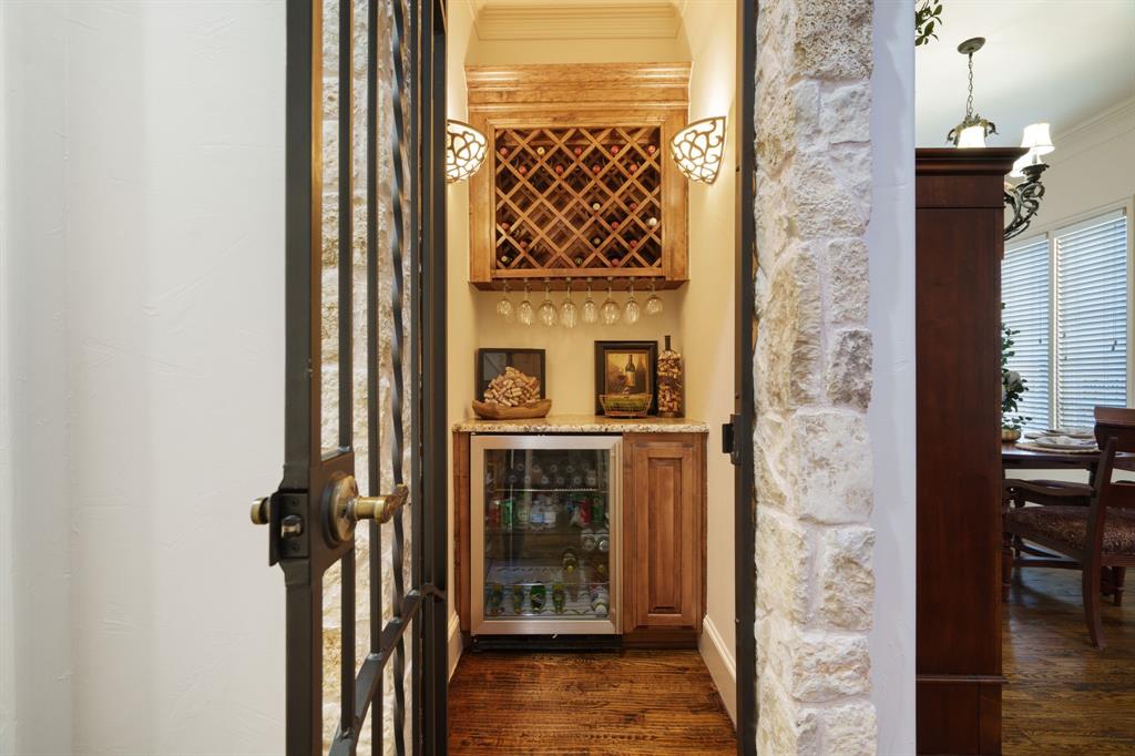 6724 Frankford Road Dallas, TX 75252 - Photo 19 of 40 a view of a hallway with wooden floor and entryway