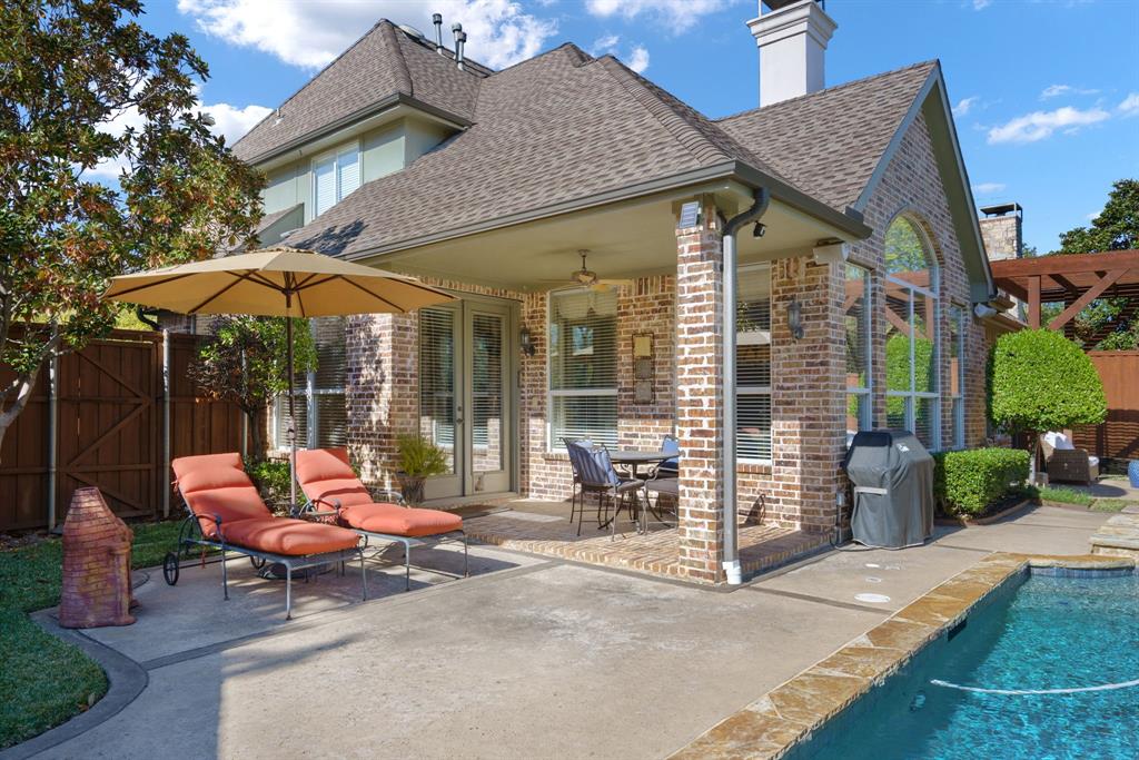 6724 Frankford Road Dallas, TX 75252 - Photo 37 of 40 a backyard of a house with outdoor seating