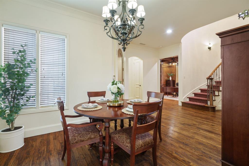6724 Frankford Road Dallas, TX 75252 - Photo 9 of 40 a view of a dining room with furniture and wooden floor