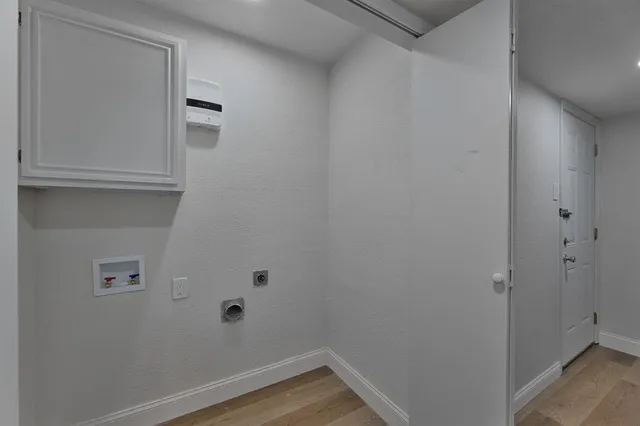 a view of small space with wooden floor