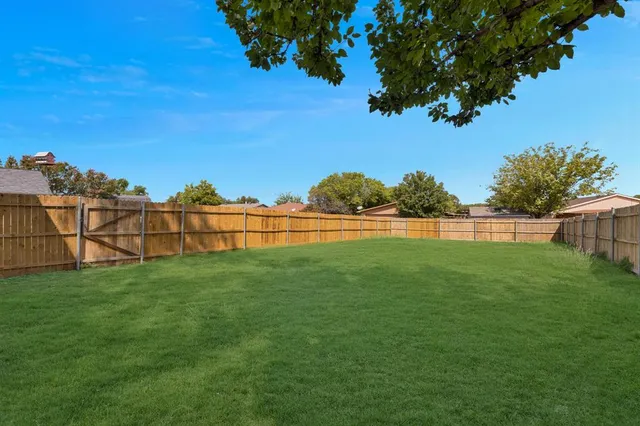 a view of outdoor space and yard