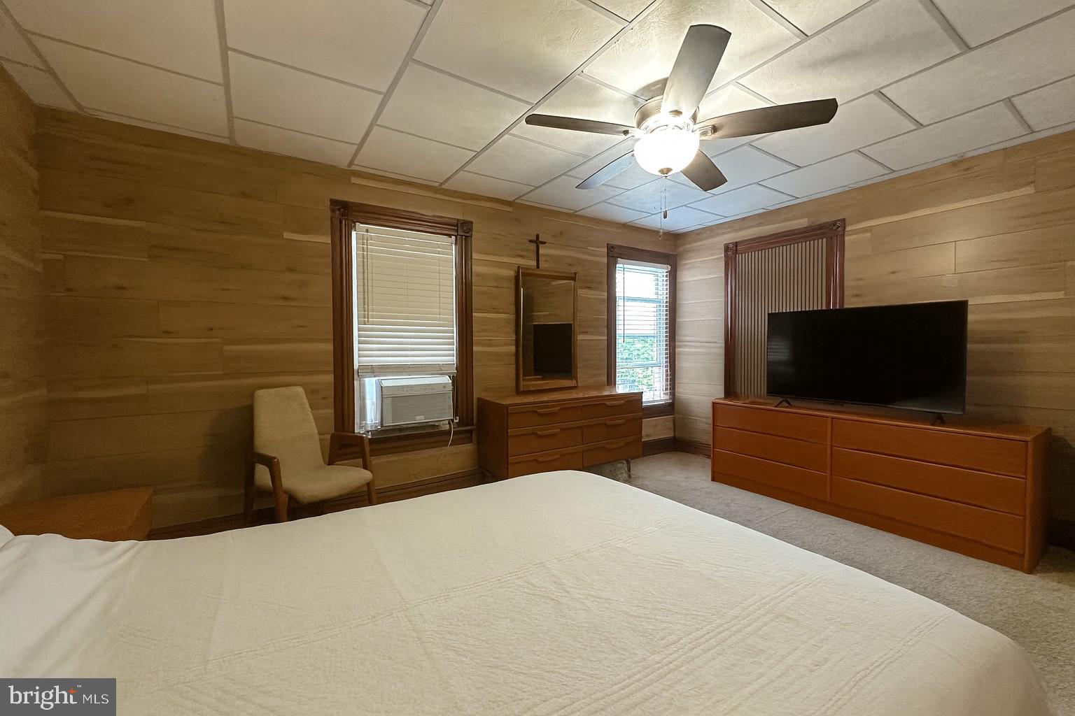 10128 Hummingbird Street Ellerslie, MD 21529 - Photo 11 of 21 a bedroom with a bed and a flat screen tv