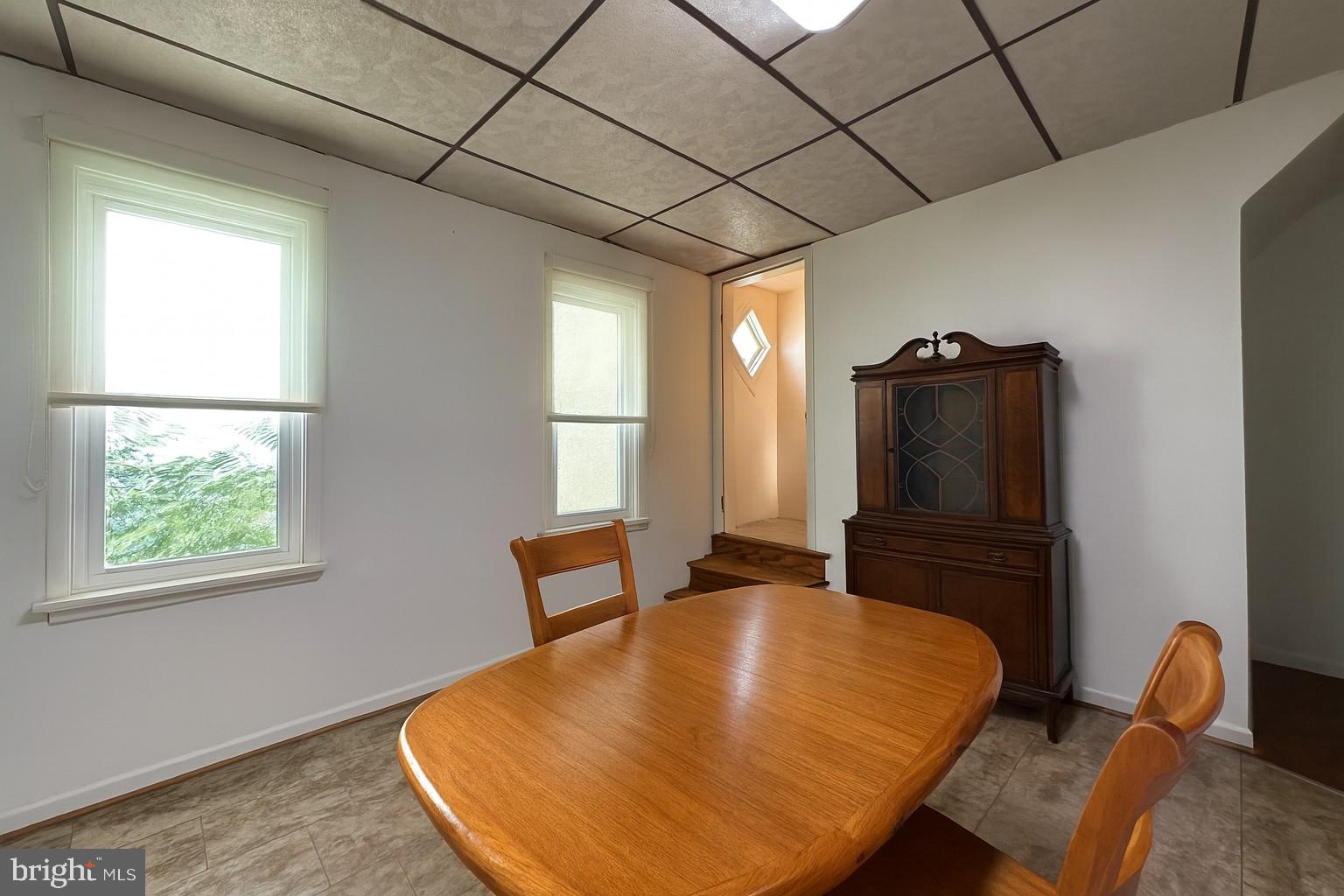 10128 Hummingbird Street Ellerslie, MD 21529 - Photo 8 of 21 a bedroom with a bed and wooden floor