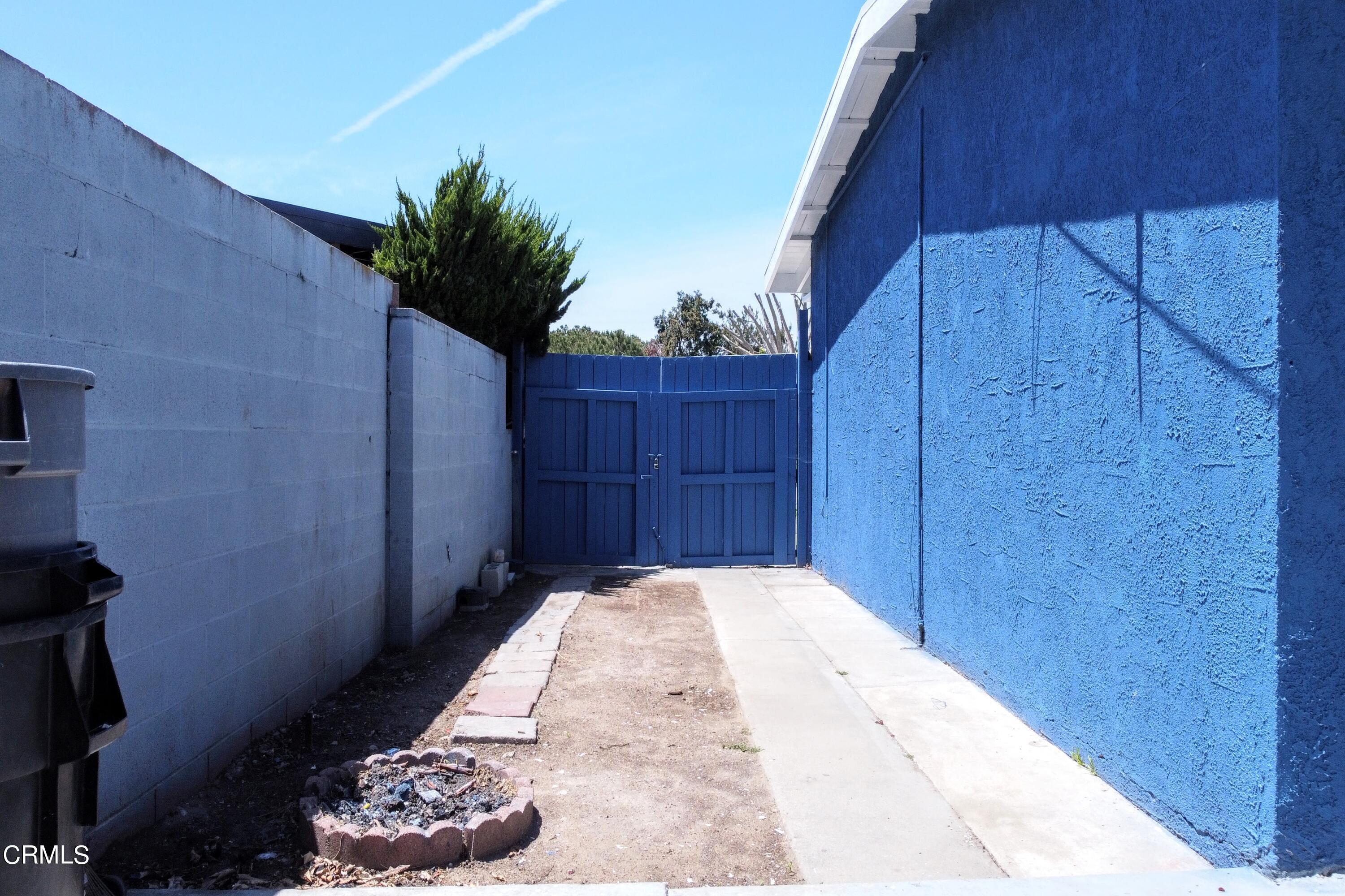 1830 Claremont Drive Oxnard, CA 93035 - Photo 30 of 36 a view of a backyard with wooden fence