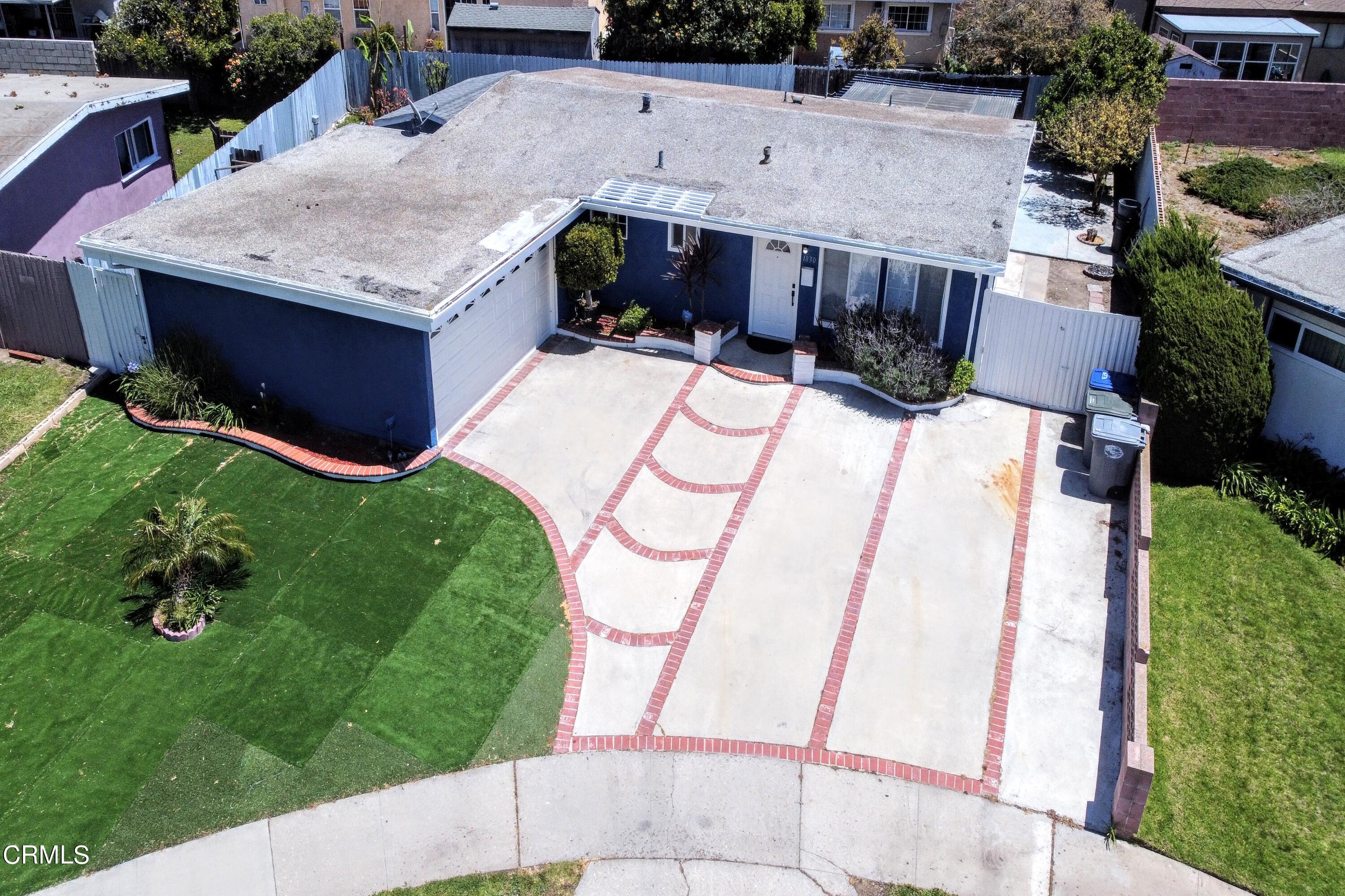 1830 Claremont Drive Oxnard, CA 93035 - Photo 3 of 36 an aerial view of a house roof deck with couches and wooden floor