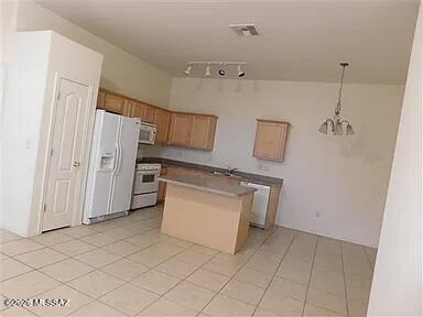 6016 South Avenida Ribero Tucson, AZ 85706 - Photo 5 of 6 6180d08046e216780e1483d0b111a57f-cc_ft_3