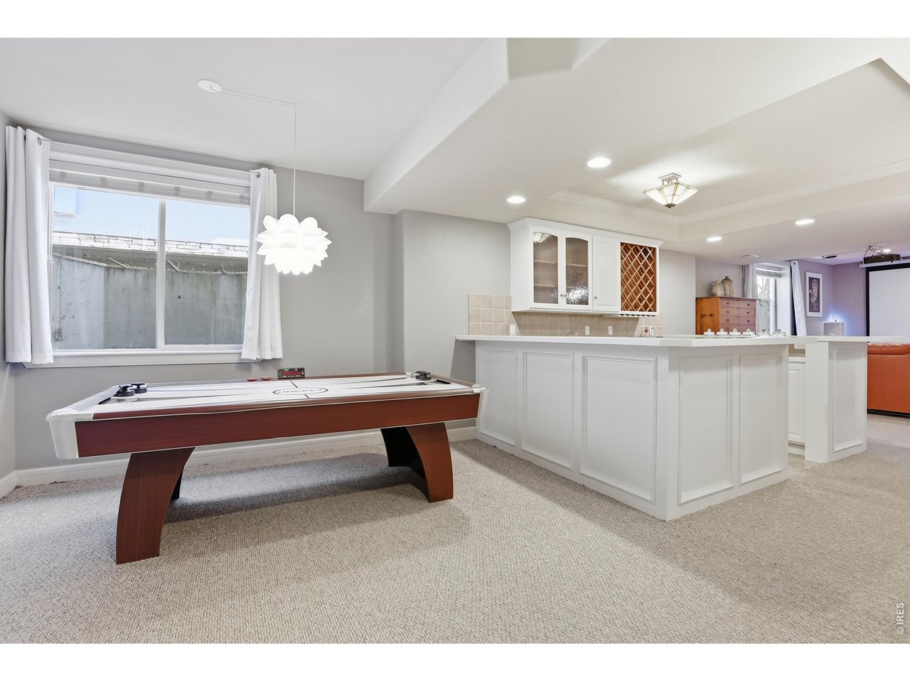 714 Skywalker Point Lafayette, CO 80026 - Photo 26 of 44 Basement is built for fun! Air Hockey Table is optionally included!
