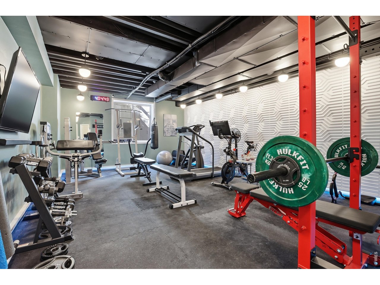 714 Skywalker Point Lafayette, CO 80026 - Photo 32 of 44 Large Storage Room converted to an amazing home gym. Most equipment optionally included (except Peloton, some weights)
