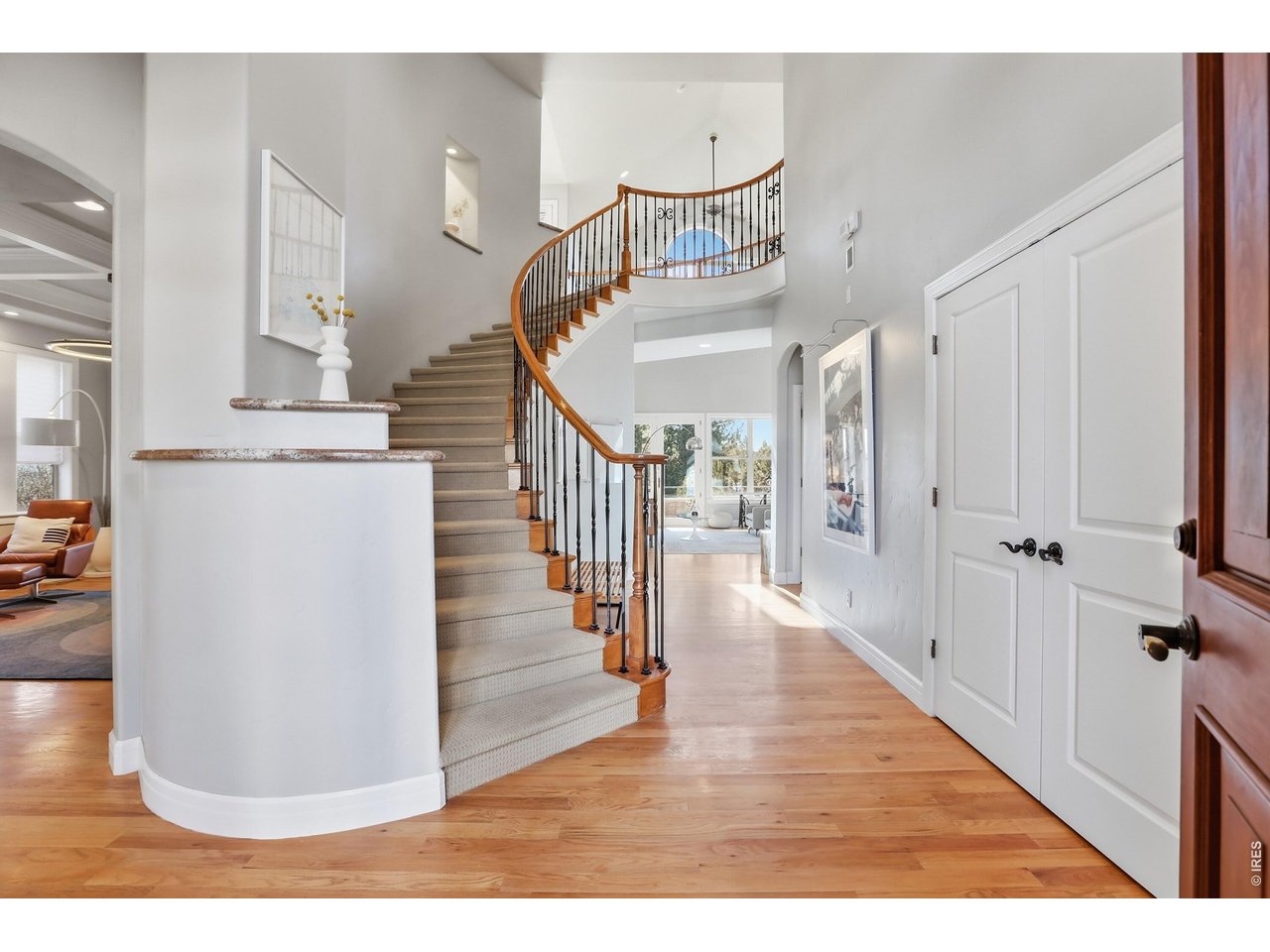 714 Skywalker Point Lafayette, CO 80026 - Photo 4 of 44 Elegant winding staircase