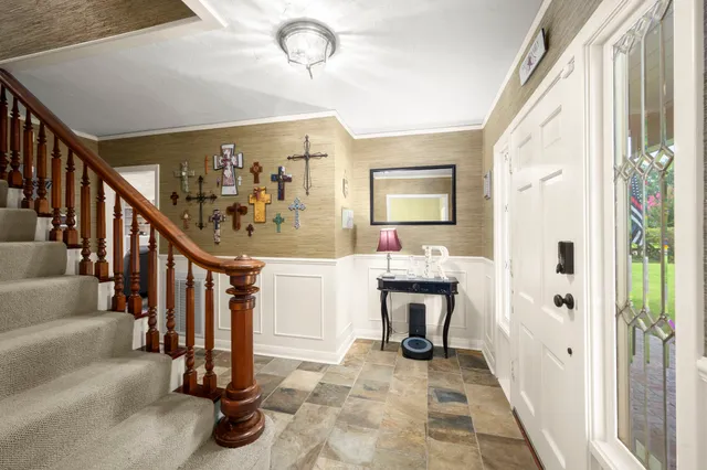 a view of entryway with livingroom and furniture